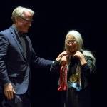 President Bradley W. Bateman presents the Pearl S. Buck Award to Maxine Hong Kingston.