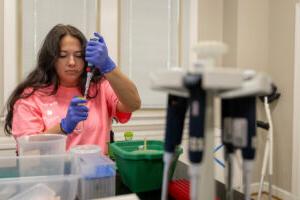 Gracie Oliver works with a sample in the lab. 